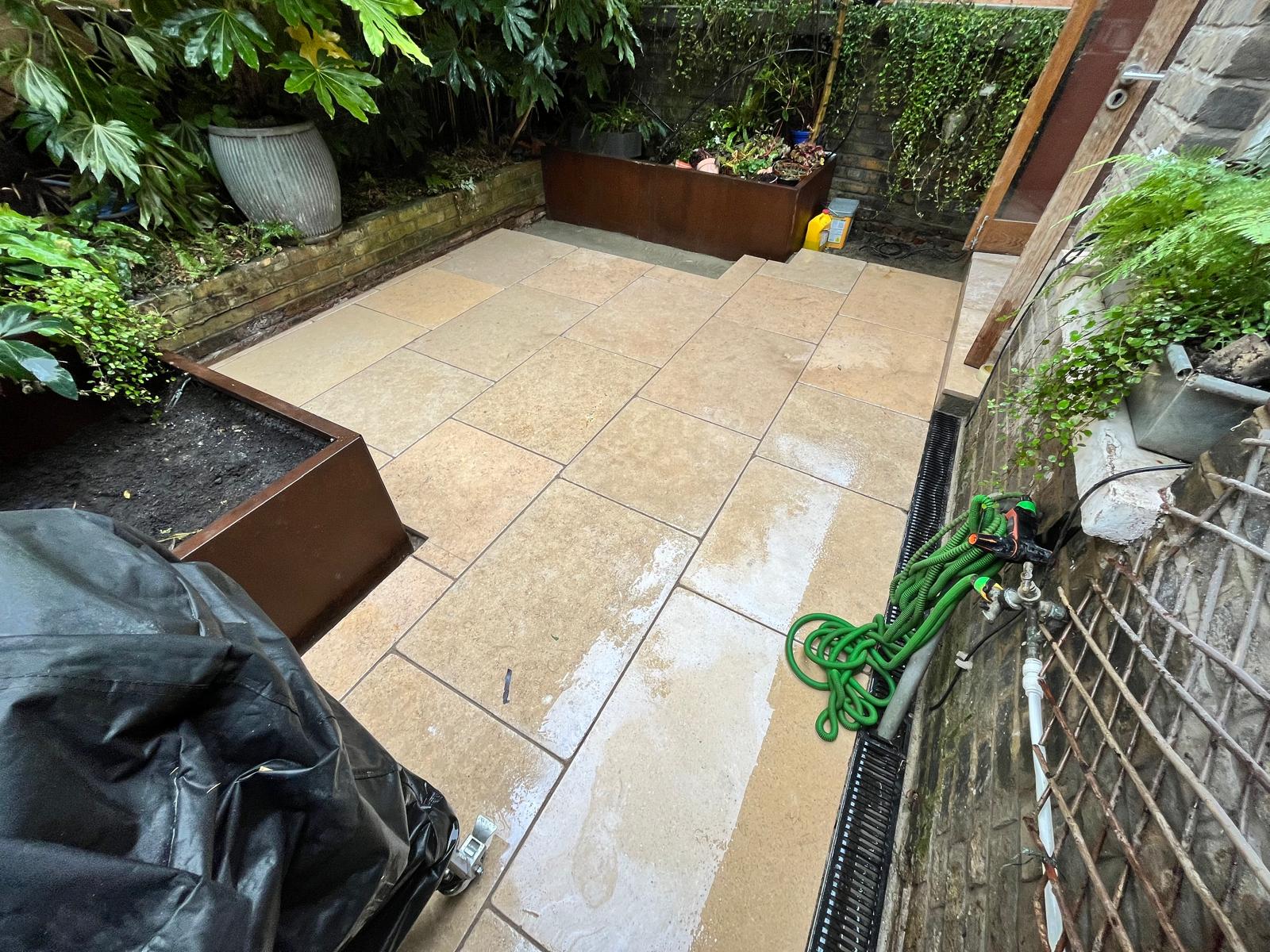Courtyard paving with corten planters