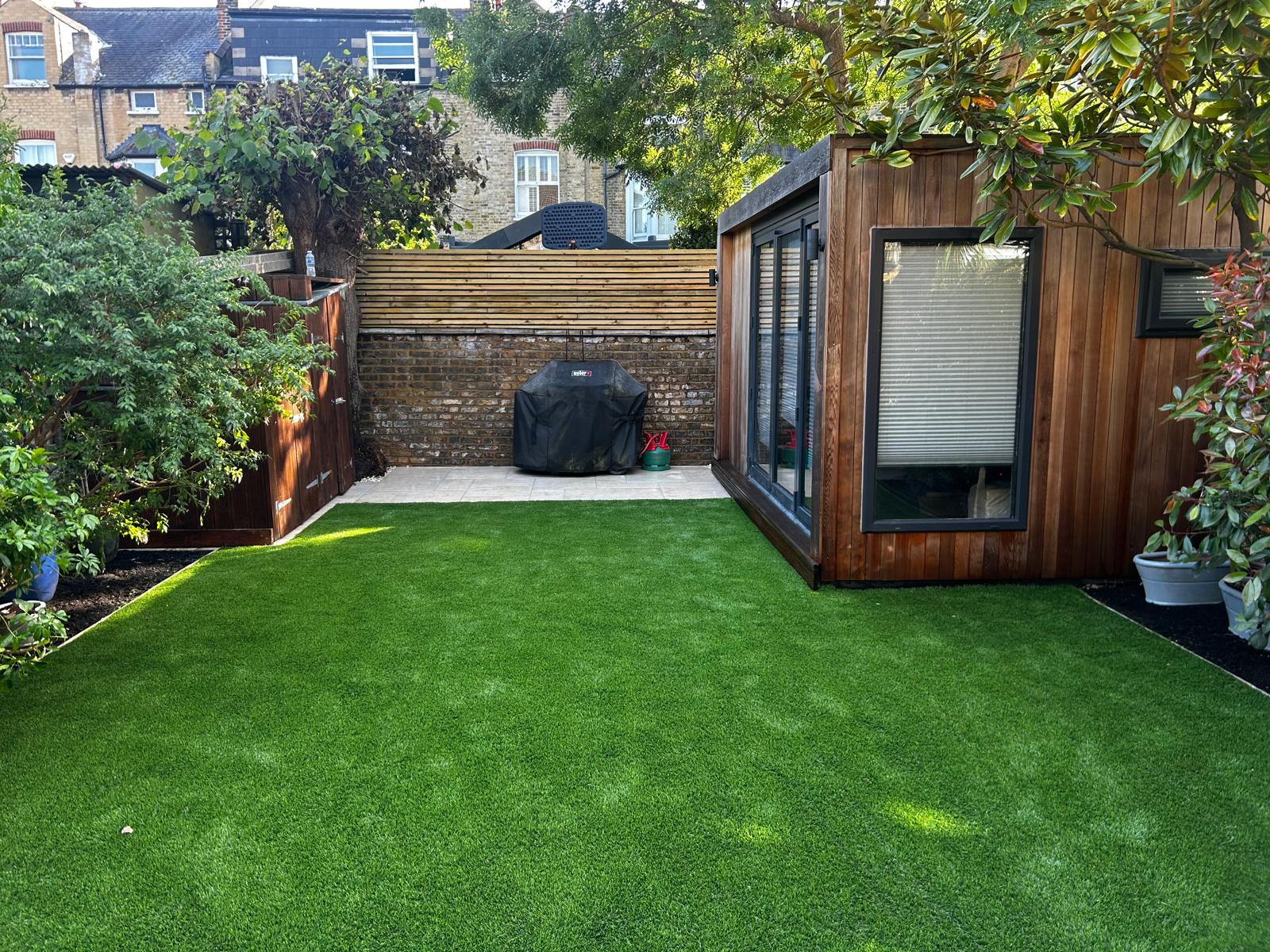 Artificial grass garden with garden studio